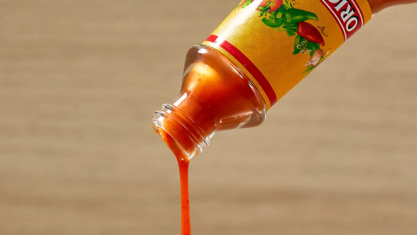 cholula original hot sauce pouring out of a bottle